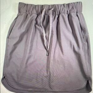 Lululemon On the Fly Women’s purple skirt sz 6 pockets